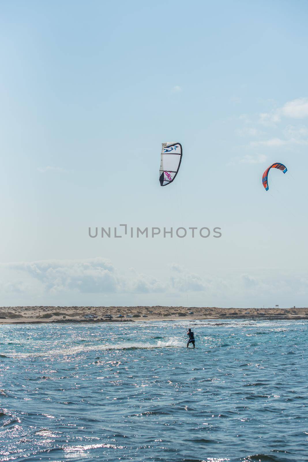 Fuerteventura, Spain : 2020 October 2 : Blonde Woman in the pratic Kite Surf in the Playas de los Charcos in El Cotillo on Fuerteventura in summer 2020.