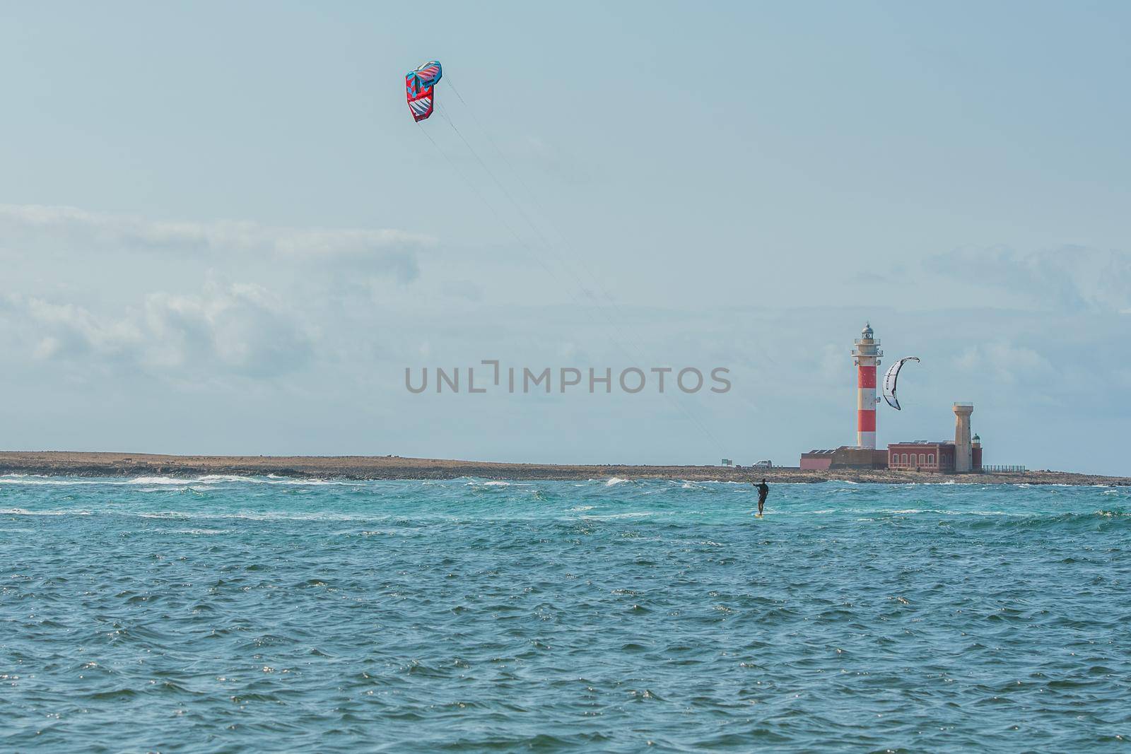 Fuerteventura, Spain : 2020 October 2 : Blonde Woman in the pratic Kite Surf in the Playas de los Charcos in El Cotillo on Fuerteventura in summer 2020.