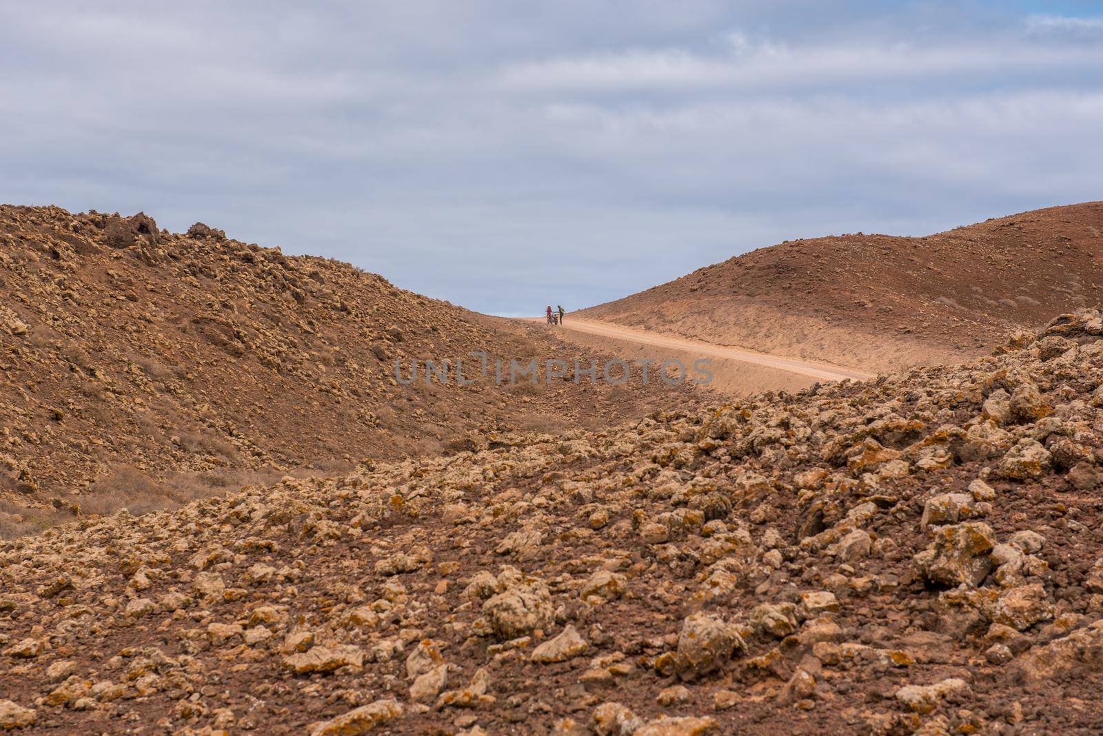 Corralejo, Fuerteventura, Spain: 2020 September 02: Tourist in electric bikes on the Fuerteventura Nature Trail GR 131 from Corralejo to Morro Jable in summer 2020.