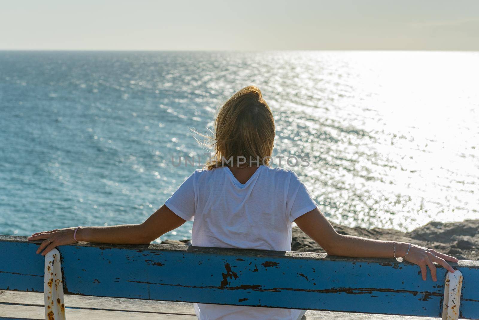 El Cotillo, Spain : 2020 October 1 : Young Blonde in the coast in Fuerteventura at El Cotillo in the Canary Islands, Spain in summer 2020.