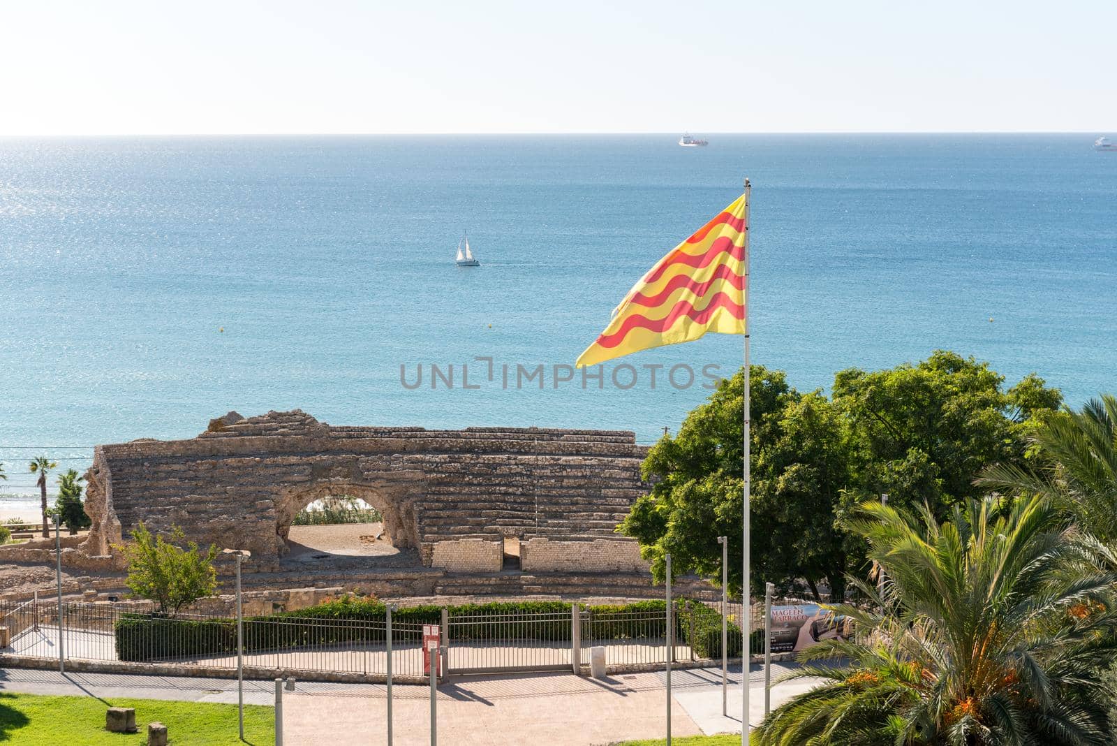 Tarragona, Spain : 2020 September 27: Sunny day in Tarragona Amphitheatre in Spain - A UNESCO World Heritage Site in summer.