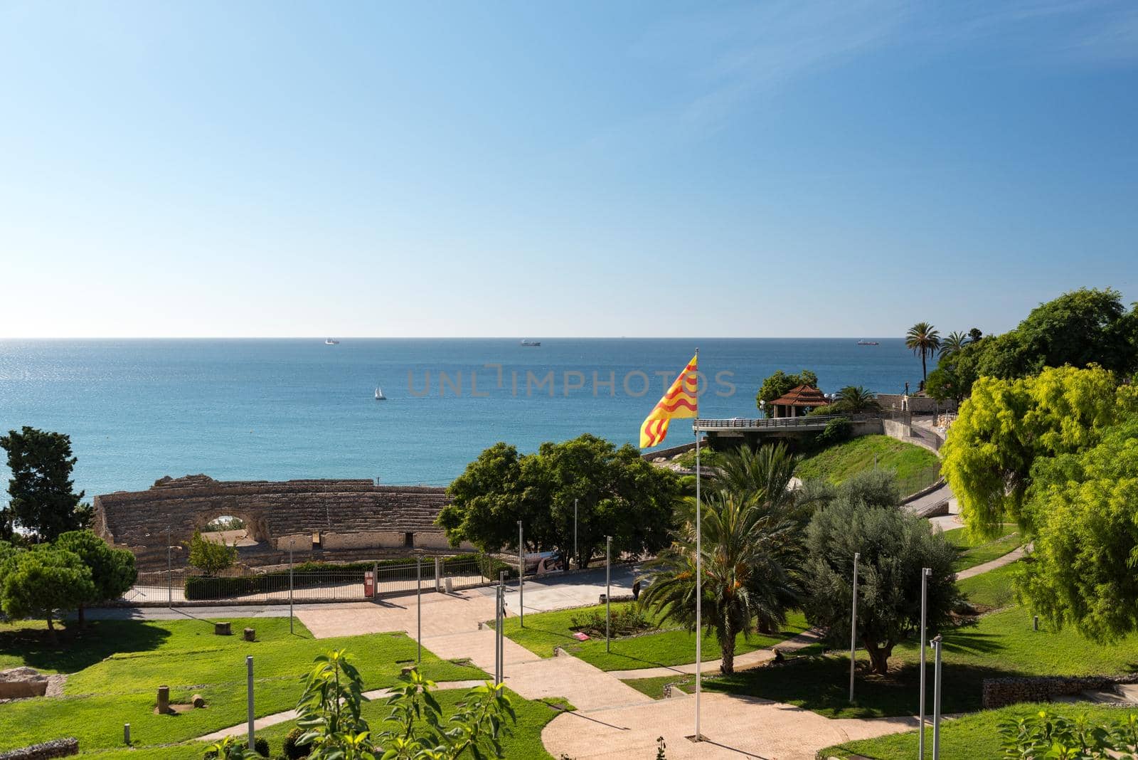 Tarragona, Spain : 2020 September 27: Sunny day in Tarragona Amphitheatre in Spain - A UNESCO World Heritage Site in summer.