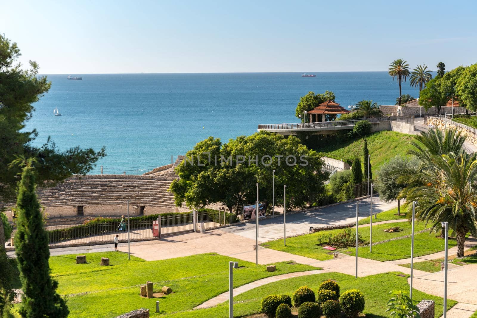 Tarragona, Spain : 2020 September 27: Sunny day in Tarragona Amphitheatre in Spain - A UNESCO World Heritage Site in summer.