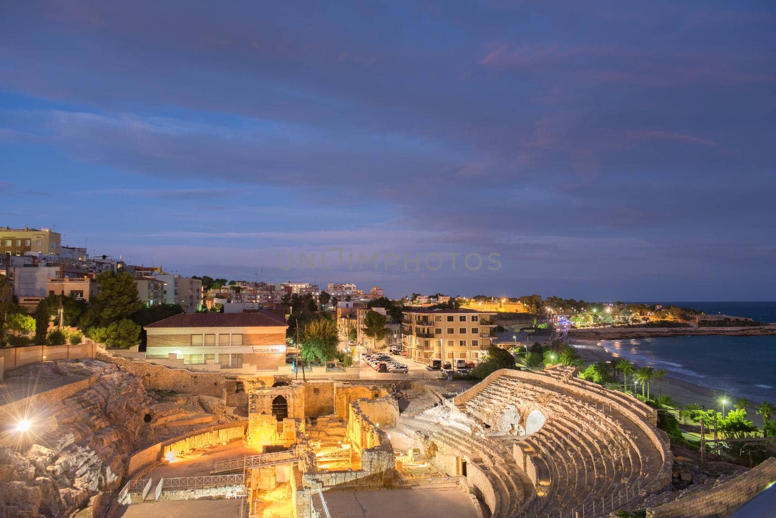 Tarragona, Spain : 2020 September 27: Sunny day in Tarragona Amphitheatre in Spain - A UNESCO World Heritage Site in summer.