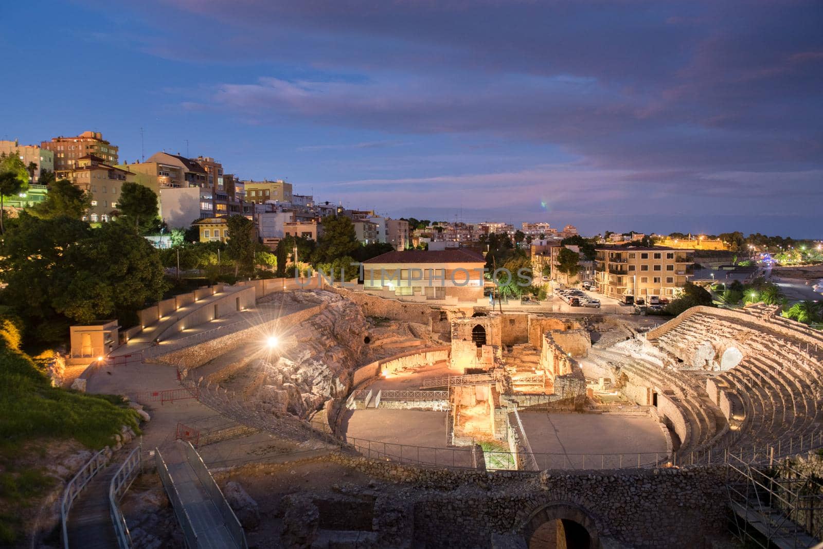 Tarragona, Spain : 2020 September 27: Sunny day in Tarragona Amphitheatre in Spain - A UNESCO World Heritage Site in summer.