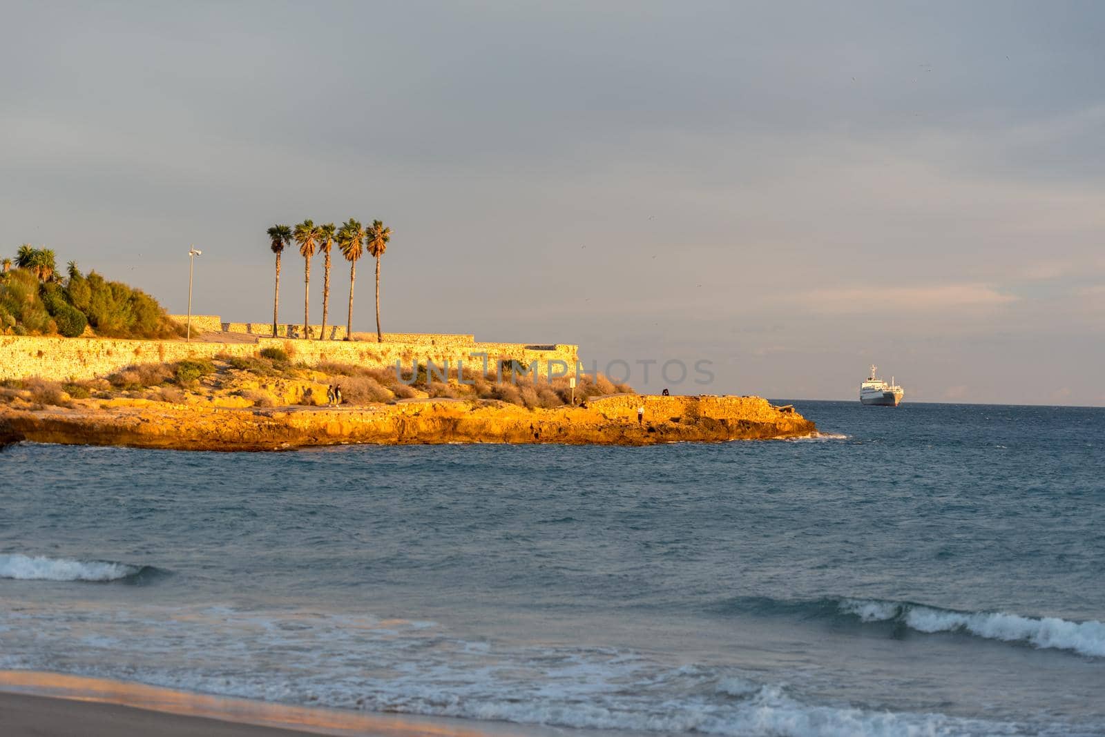 Tarragona, Spain: September 27, 2020: People surfing in the Plaza del Anfiteatro in Tarragona in the summer of 2020.