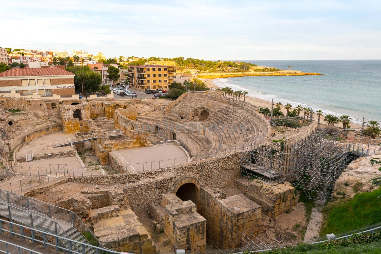 Tarragona, Spain : 2020 September 27: Sunny day in Tarragona Amphitheatre in Spain - A UNESCO World Heritage Site in summer.
