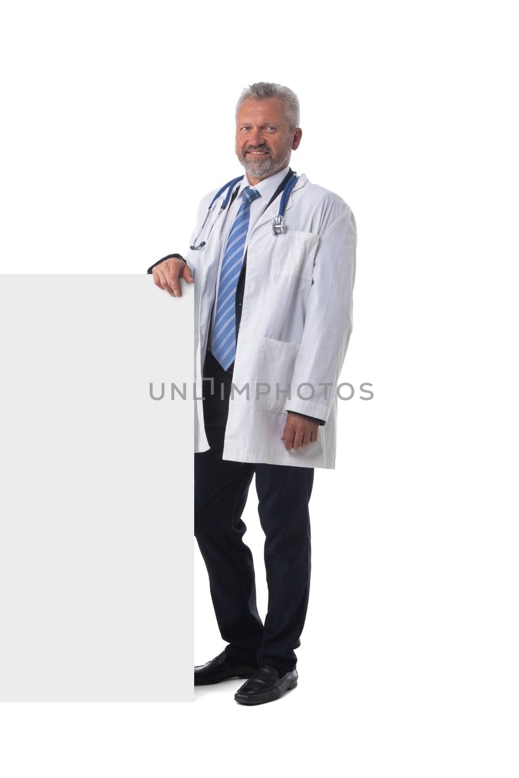 Male doctor with blank banner by ALotOfPeople