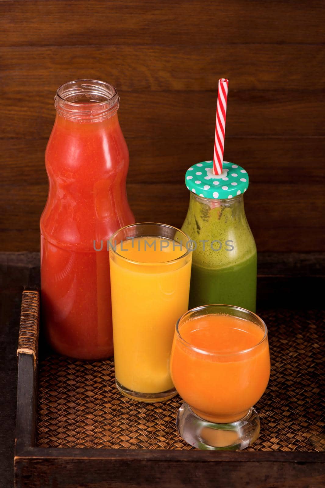 Various freshly squeezed fruits and vegetables juices