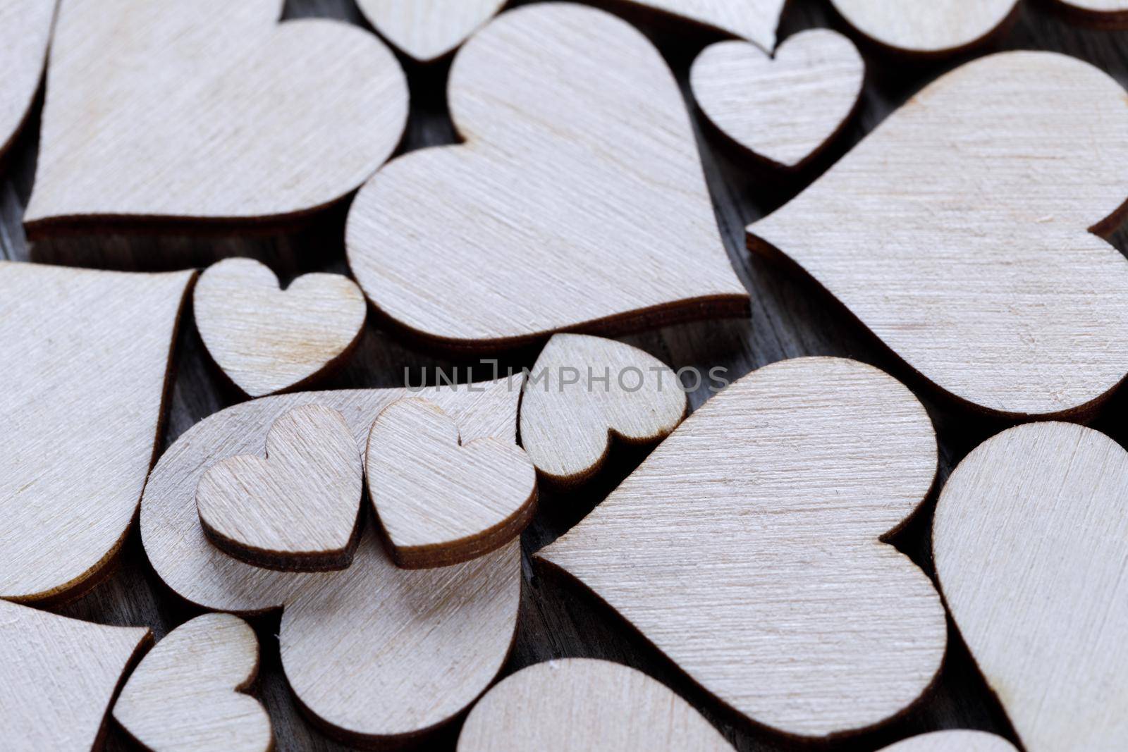 Wooden hearts background by Yellowj