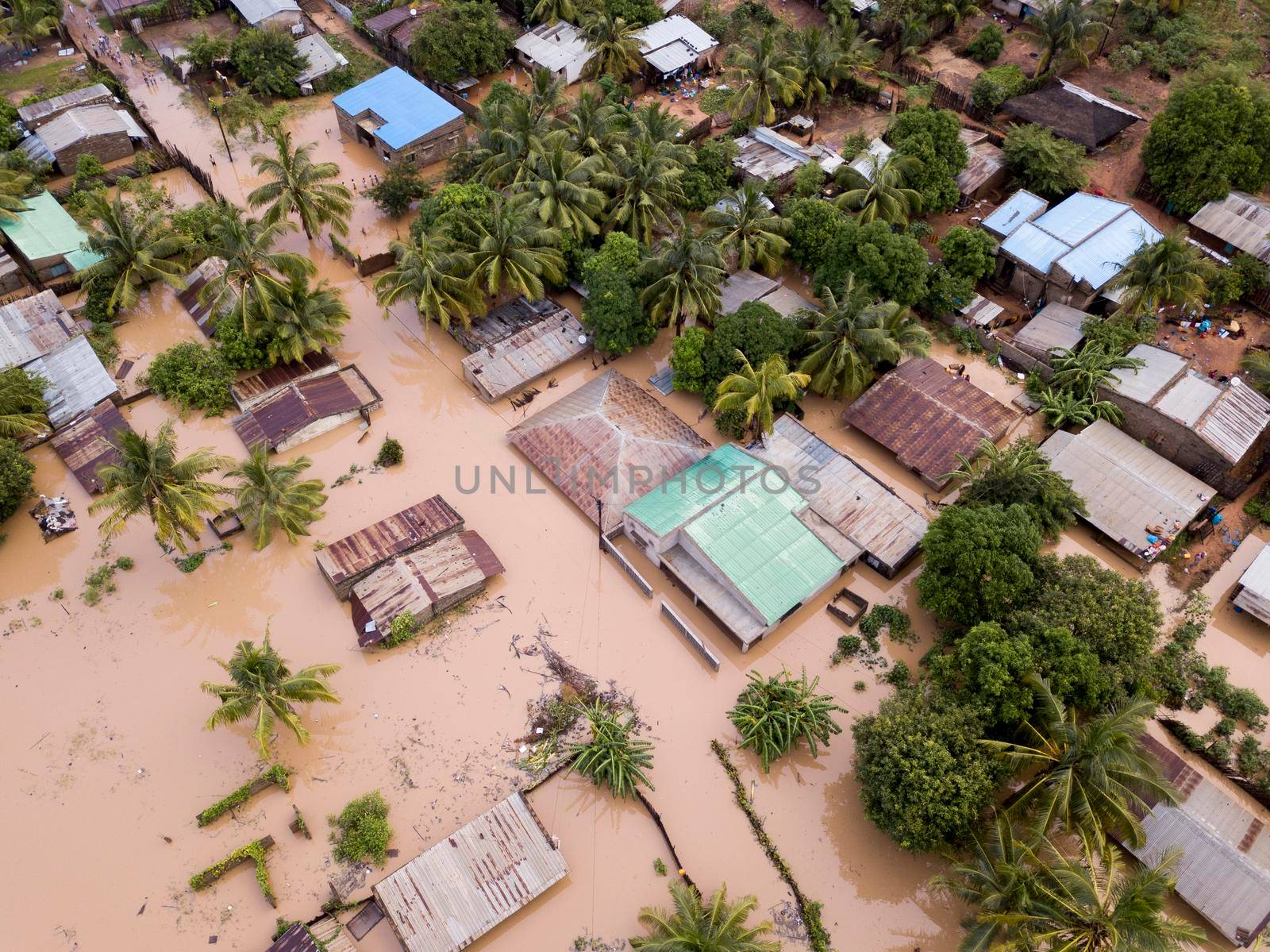 Aerial view overhead houses flooded by a cyclone by fivepointsix