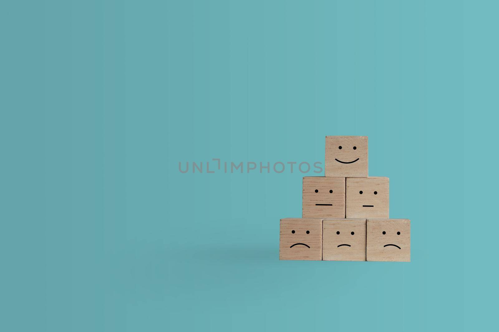 Smile face and cart icon on wood cube. Optimistic person or people feeling inside and service rating when shopping, satisfaction concept. by Suwant