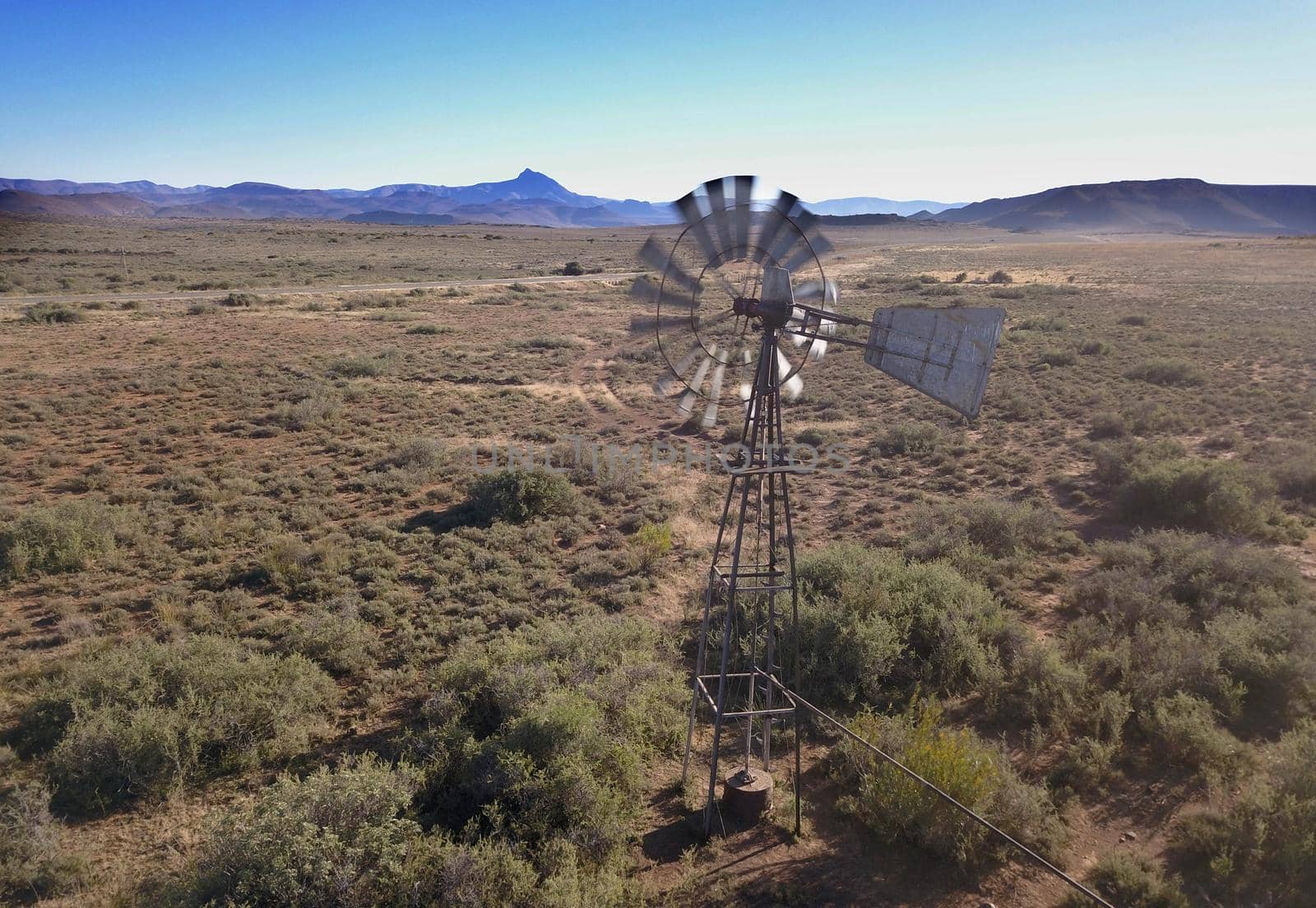 Windmill in a dry landscape