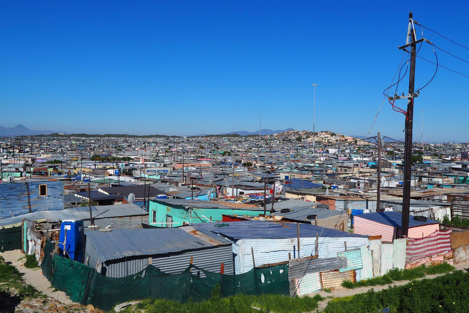 Khayelitsha township, South Africa - 29 August 2018 : BAckyard in a township in South Africa by fivepointsix