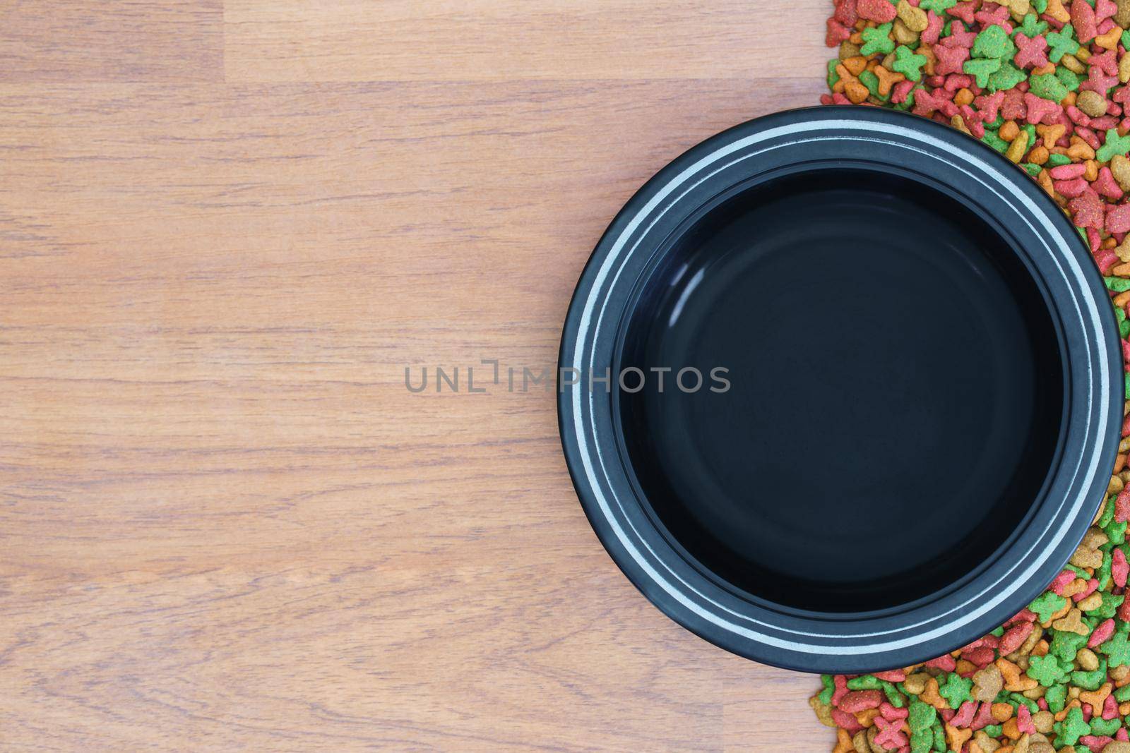 Dry cat food and empty bowl  by stoonn