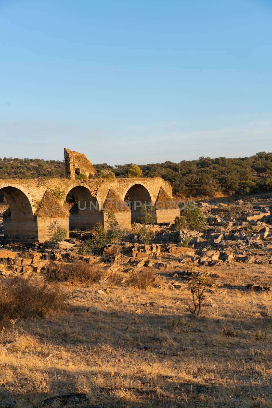 Destroyed abandoned Ajuda bridge crossing the Guadiana river between Spain and Portugal