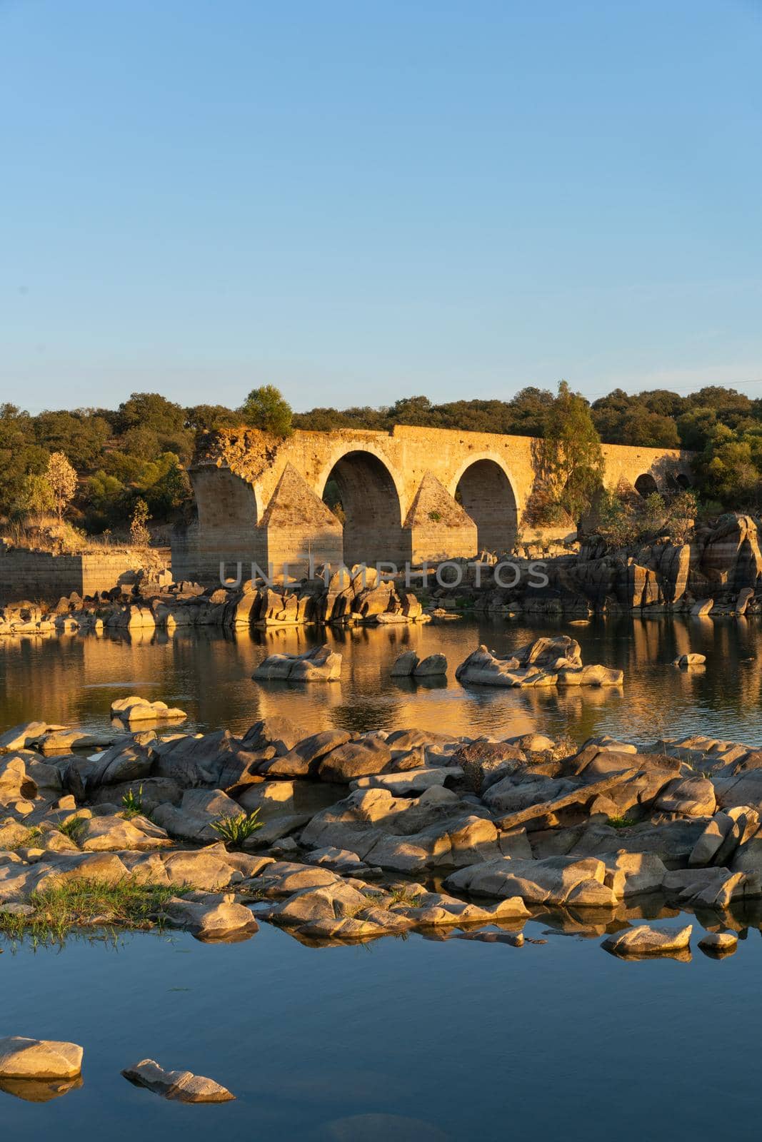 Destroyed abandoned Ajuda bridge crossing the Guadiana river between Spain and Portugal