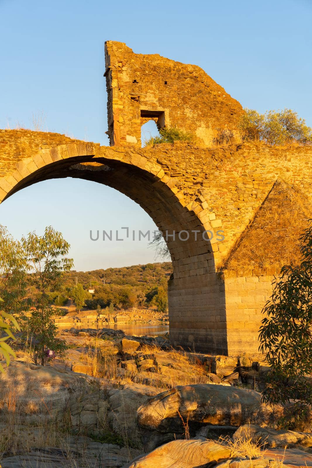 Destroyed abandoned Ajuda bridge crossing the Guadiana river between Spain and Portugal