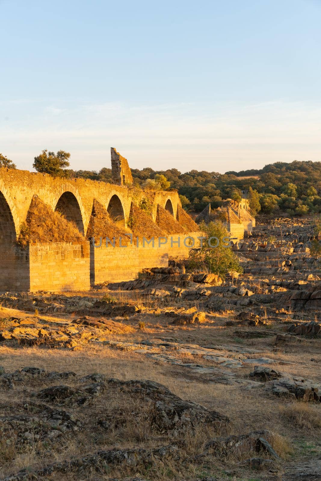 Destroyed abandoned Ajuda bridge crossing the Guadiana river between Spain and Portugal by Luispinaphotography