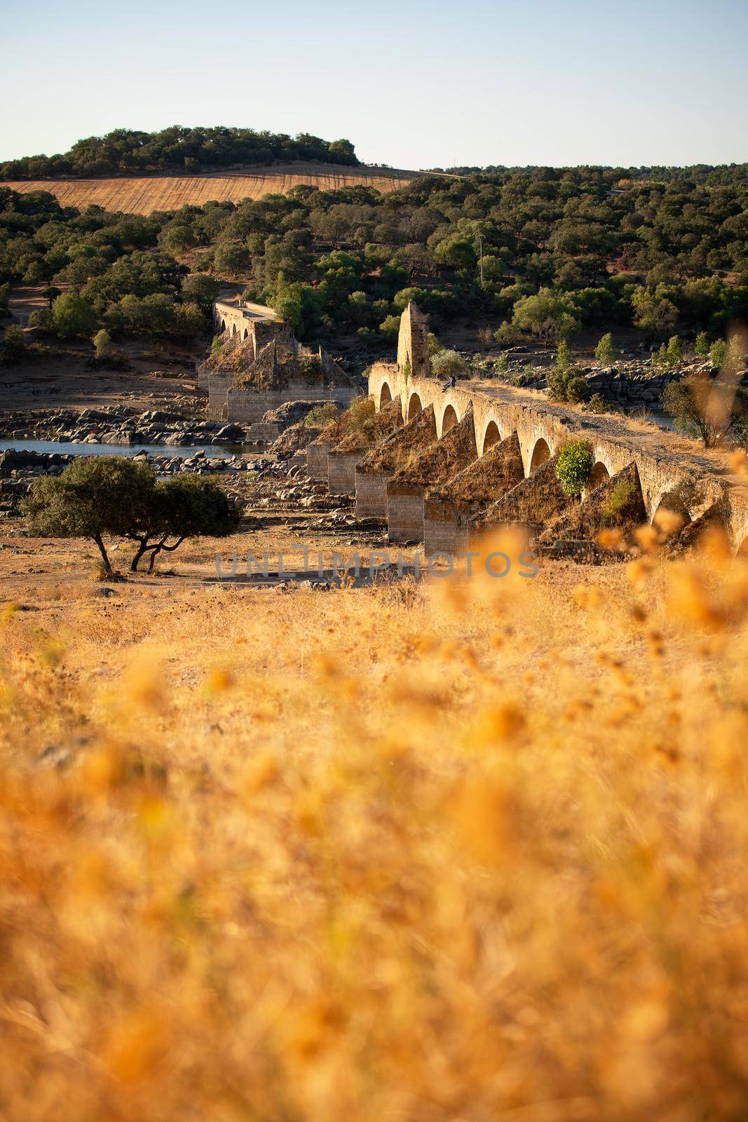 Destroyed abandoned Ajuda bridge crossing the Guadiana river between Spain and Portugal