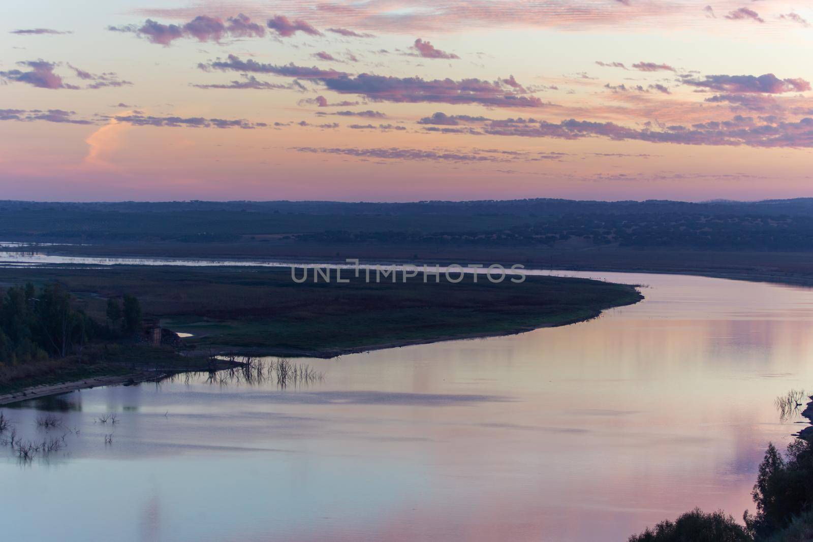 Guadiana view of the border between Portugal and Spain in Juromenha beautiful Alentejo landscape at sunset, in Portugal by Luispinaphotography