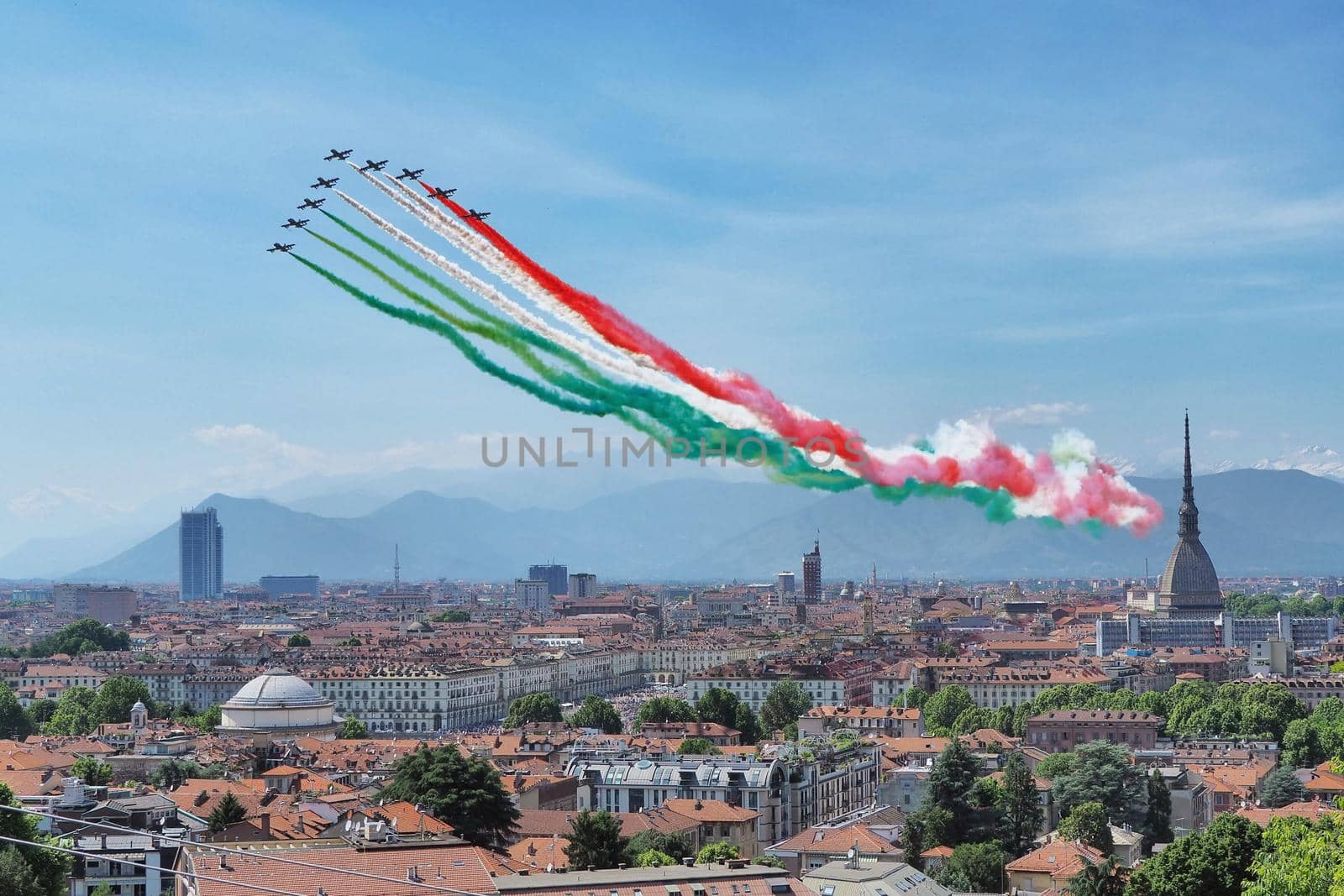 Acrobatic squad "Frecce Tricolori" flying over the city Turin Italy May 25 2020