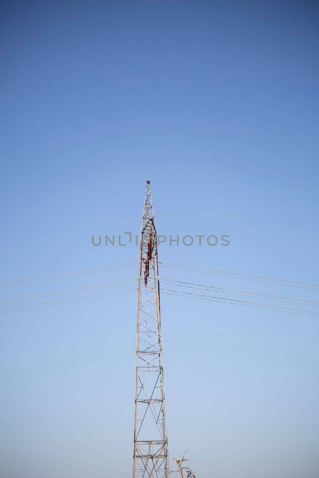 Close up of an electrical tower and its wires