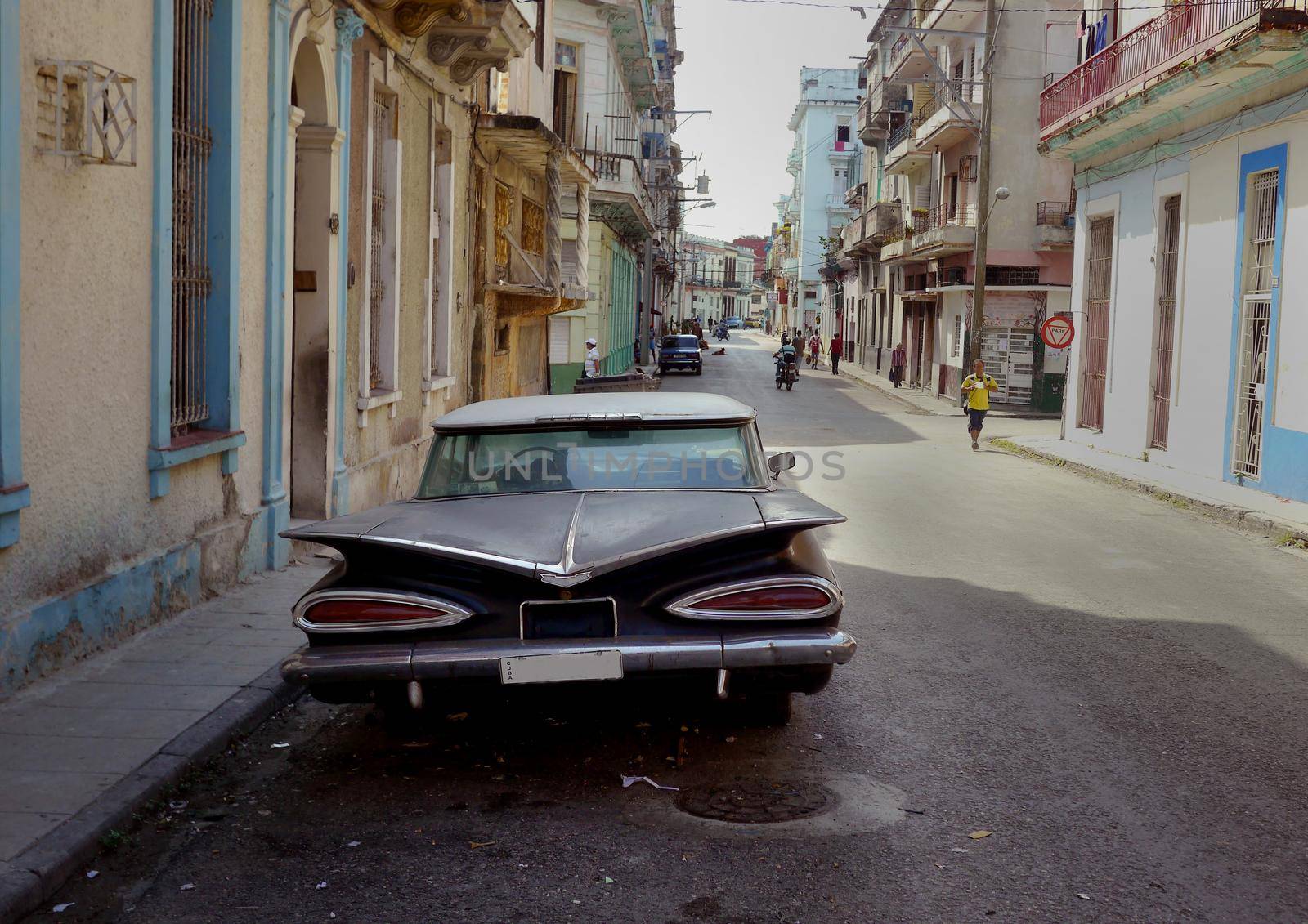 Old car in Havana backstreet, Cuba by fivepointsix