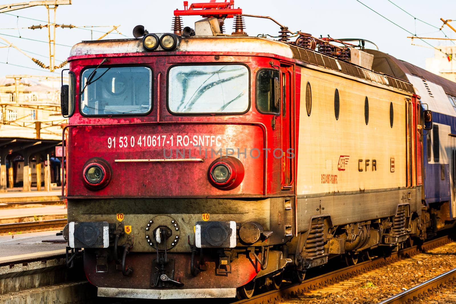 Detail of train in motion at train platform at Bucharest North Railway Station (Gara de Nord Bucharest) in Bucharest, Romania, 2020 by vladispas