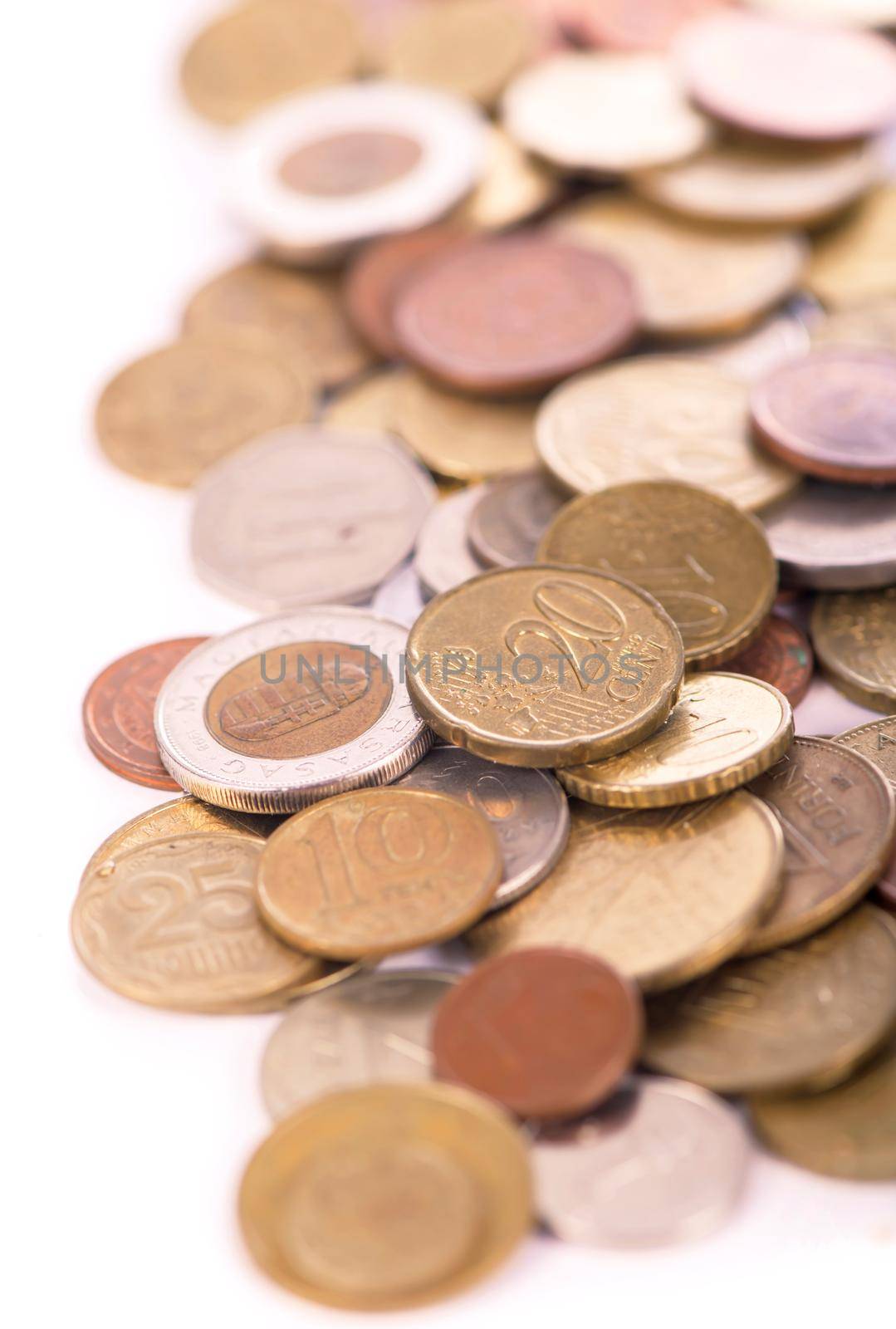 Coins of different countries on a white background. by aprilphoto