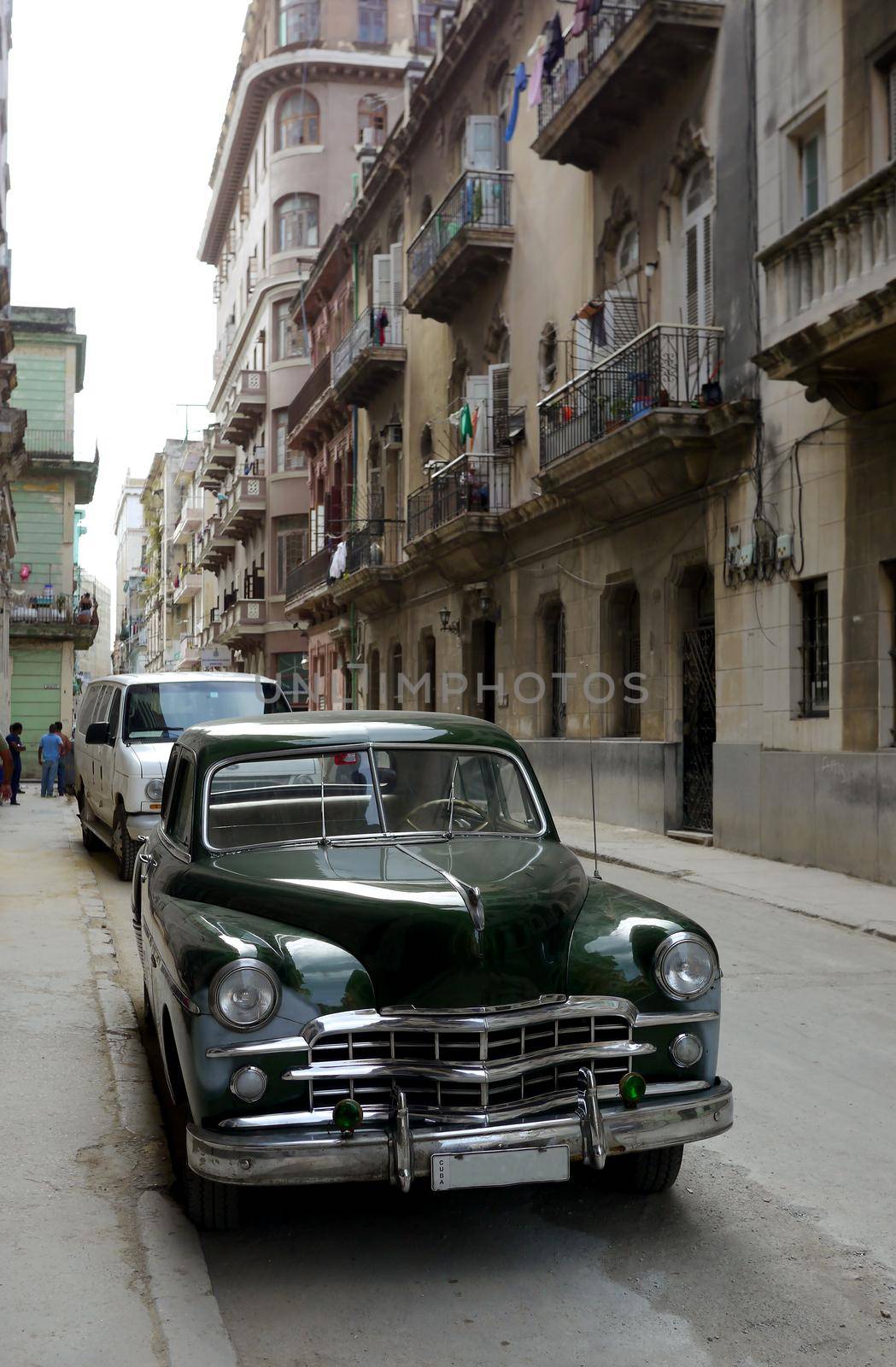 Old car in Havana backstreet, Cuba by fivepointsix