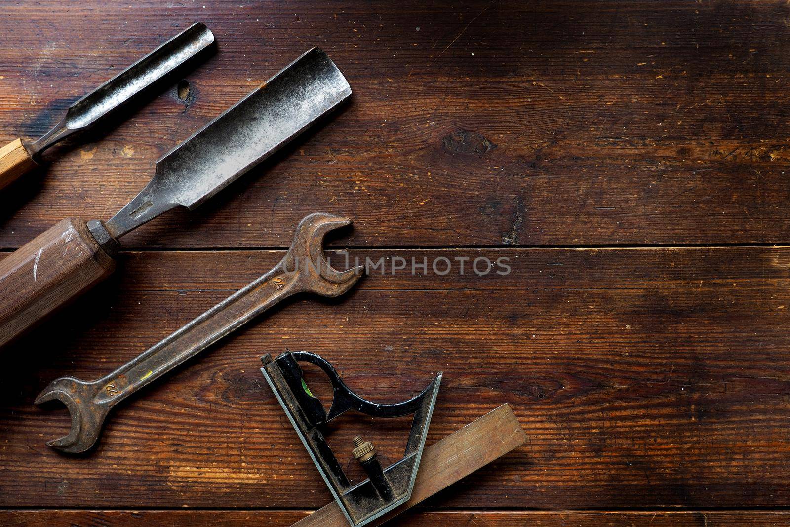 Old tools on table top, textured flat lay by fivepointsix