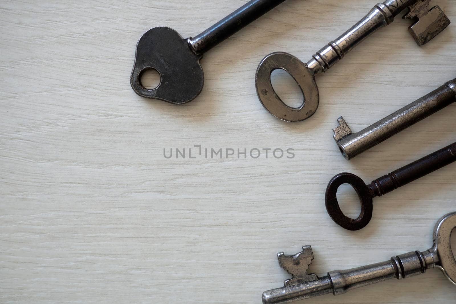 Old keys on white background