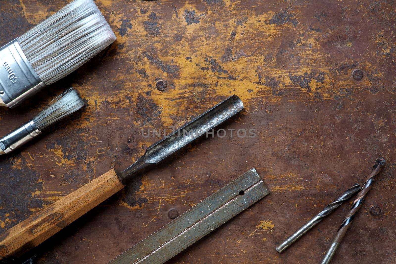 Tools flat lay on textured surface by fivepointsix