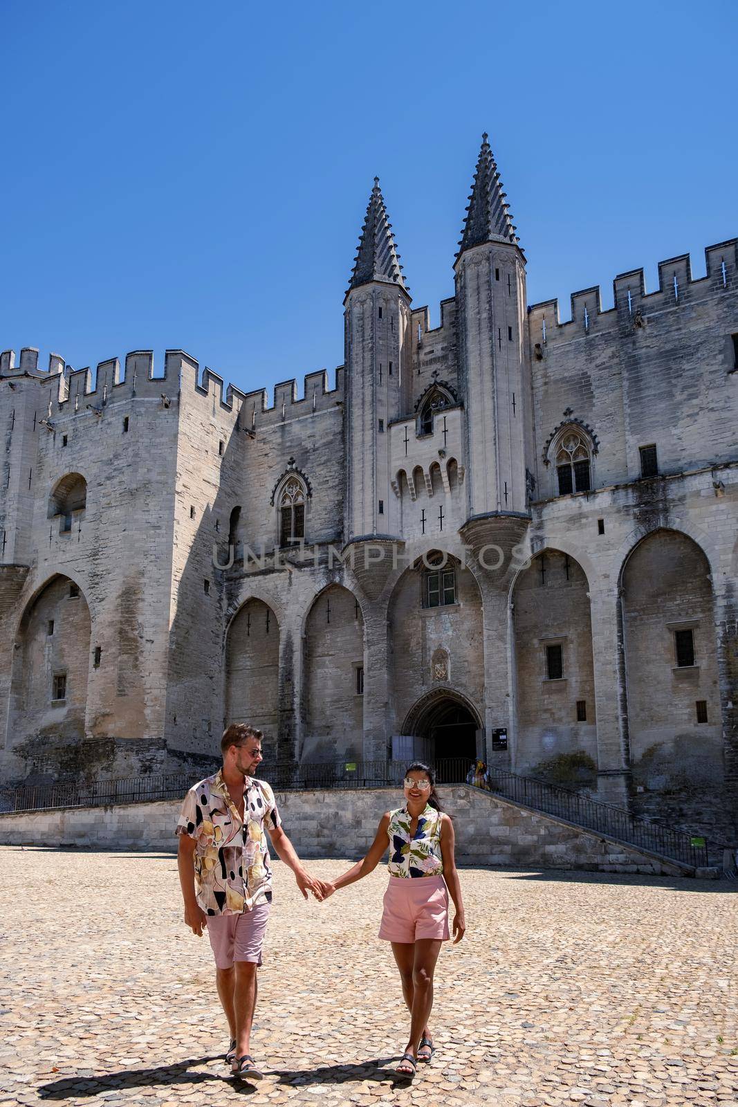 couple visit Avignon, Provence, France, men and woman mid age visit Avignon Provence France. Europe