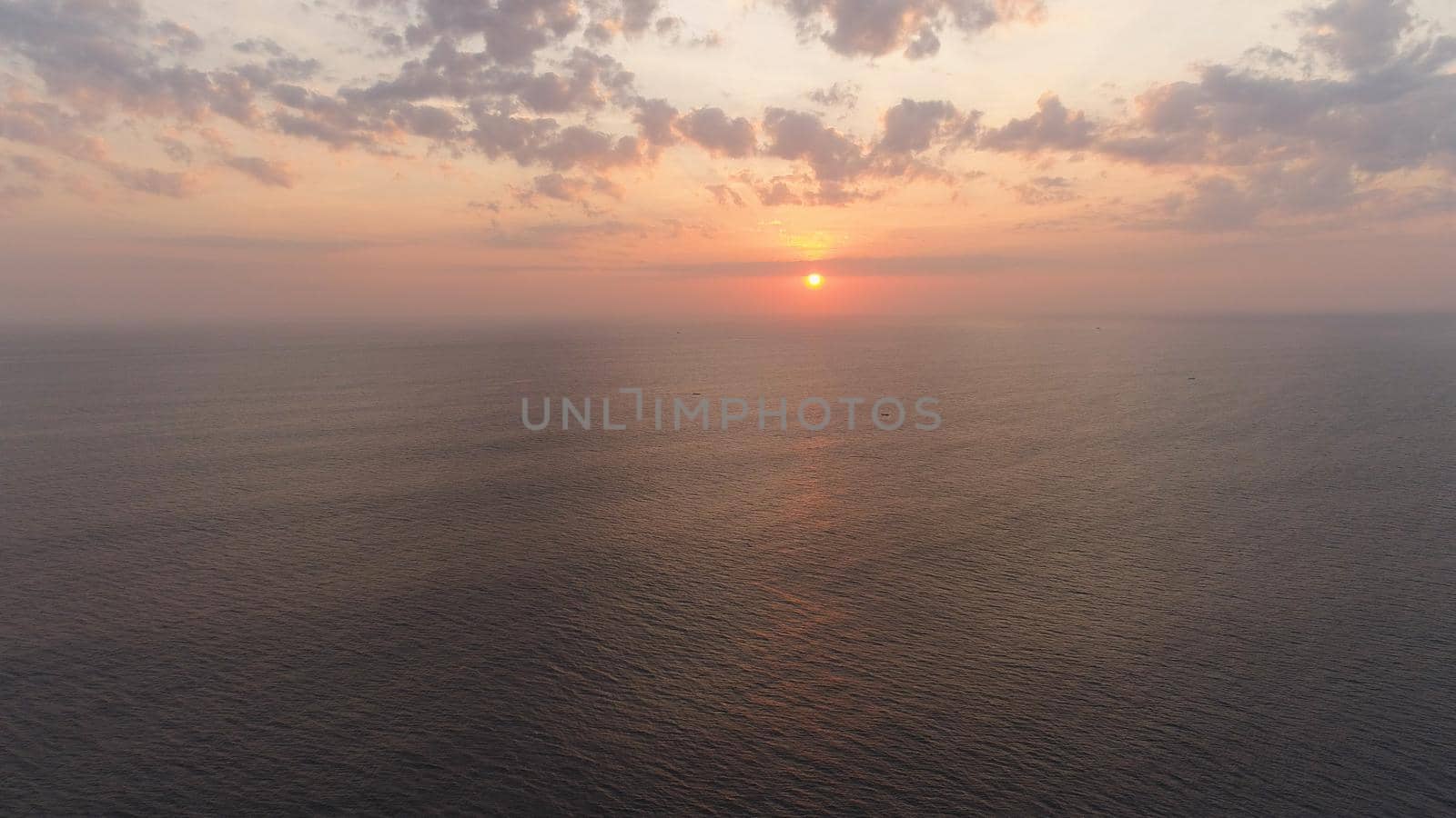 aerial view sunset over ocean. seascape Colorful sunset over the sea in the tropics