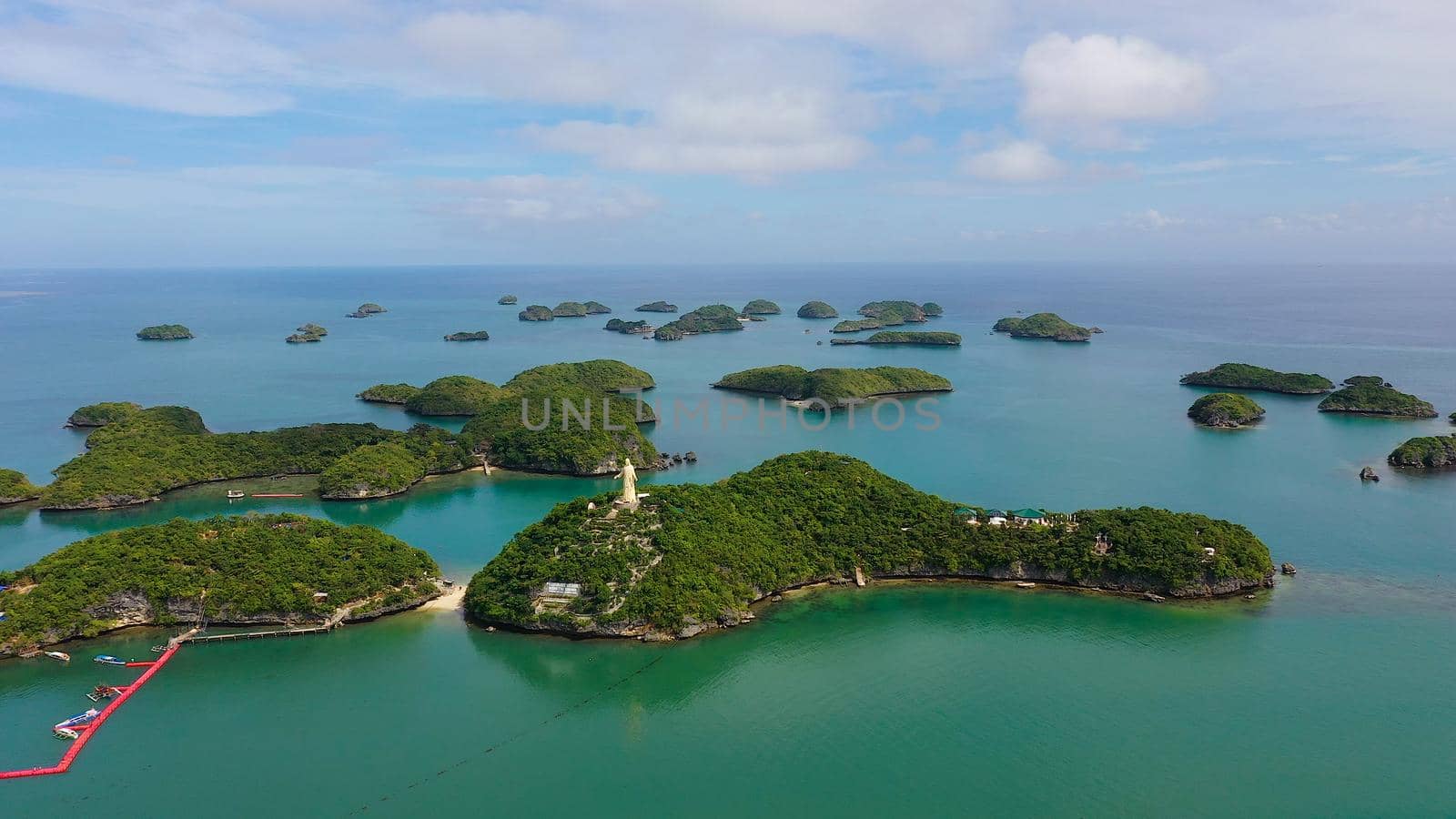 Cluster of small islands in Hundred Islands National Park, Pangasinan, Philippines. Aerial drone: Famous tourist attraction, Alaminos. Summer and travel vacation concept