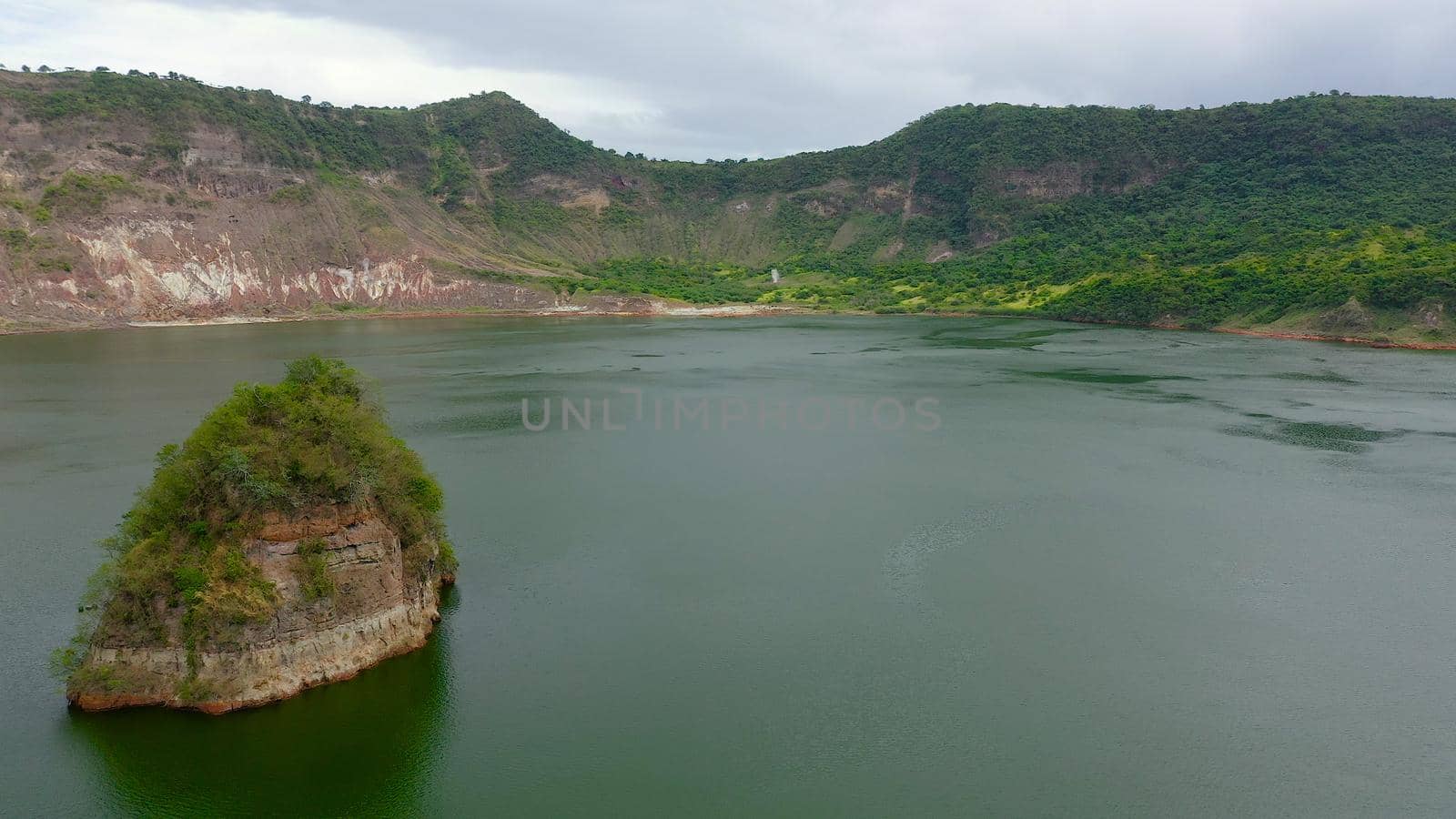 Taal volcano and the shores of the crater lake, covered with tropical greenery, top view. Tagaytay Philippines. Green lake- Taal Volcano. Travel vacation concept