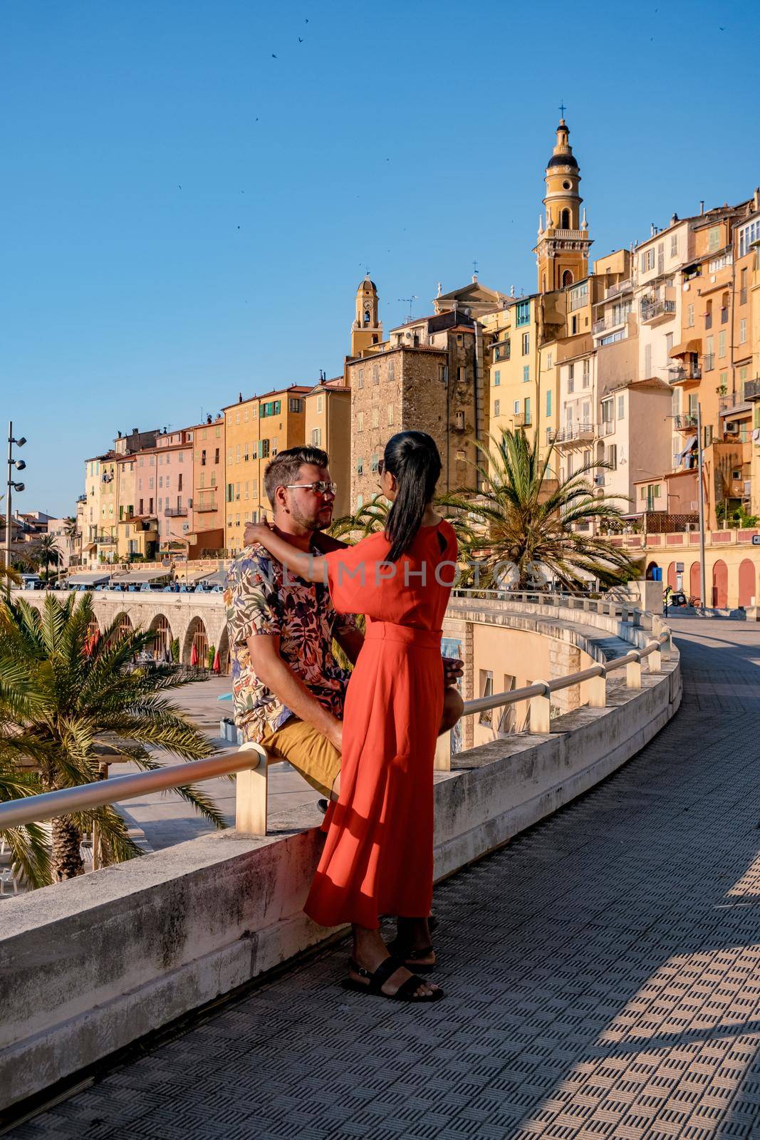 View on old part of Menton, Provence-Alpes-Cote d'Azur, France Europe during summer, couple men and woman on vacation at Menton France