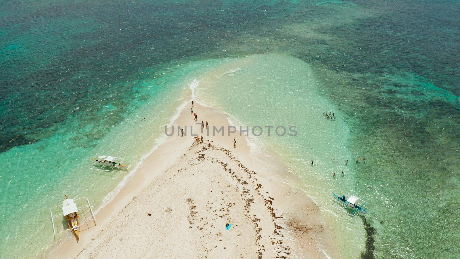 Sandy white island with beach and sandy bar in the turquoise atoll water, aerial drone. Summer and travel vacation concept, Naked Island, Siargao.