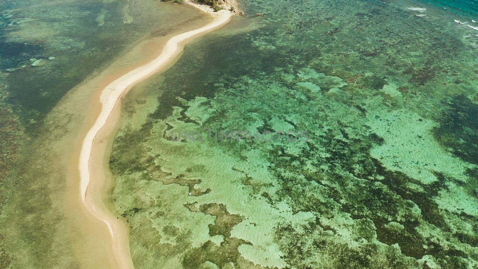Aerial drone tropical island in blue lagoon with sand bar. Palawan, Philippines. tropical landscape with island and beache