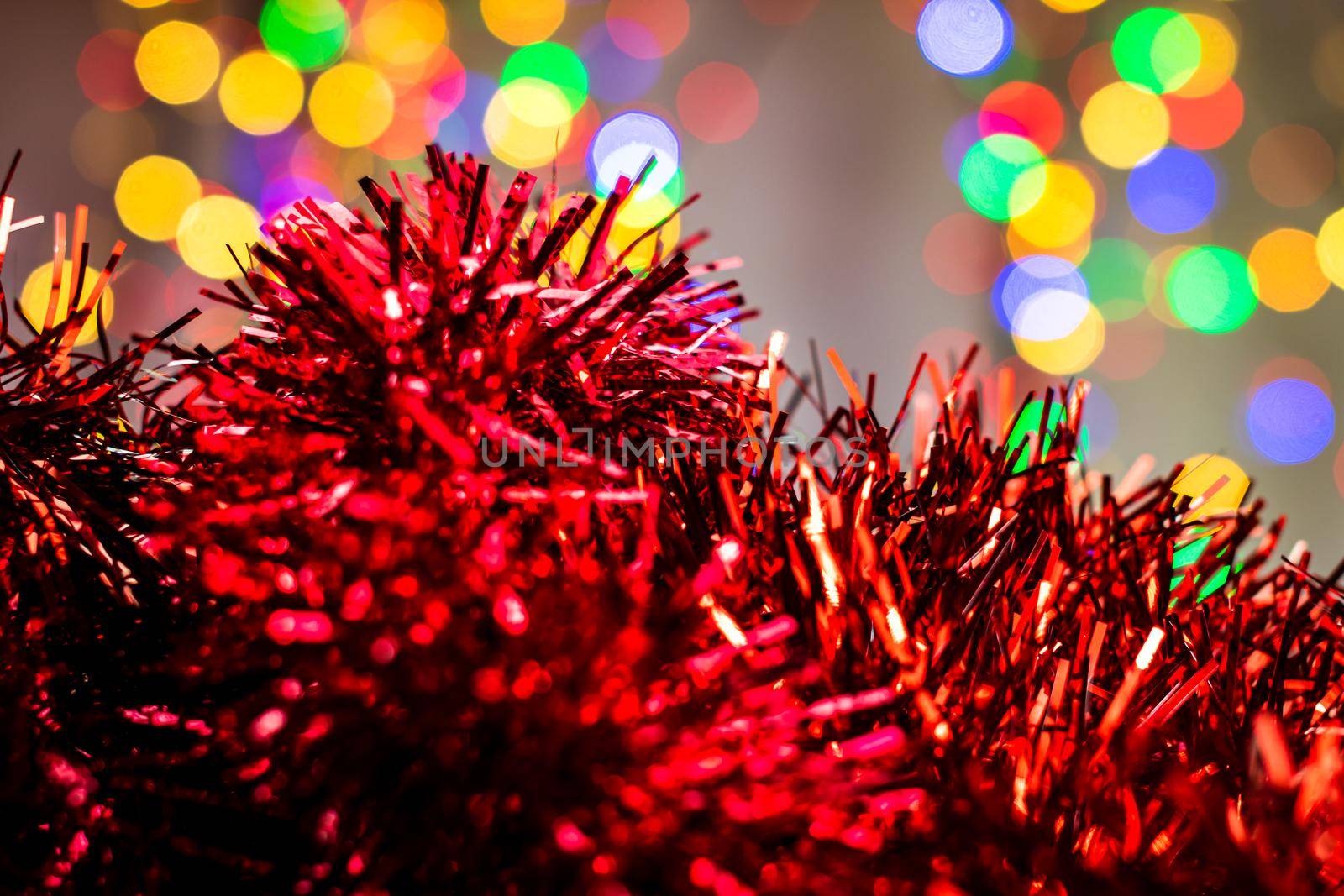 Blurred lights in Christmas composition with seasonal decorations and ornaments, colorful Christmas background christmassy mood concept.