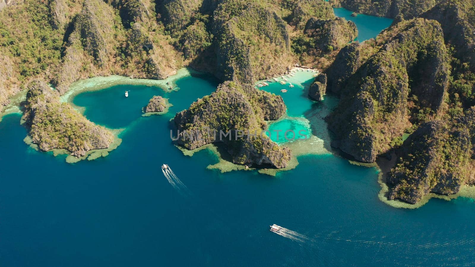 Aerial drone lagoons and coves with blue water among the rocks. lagoon, Kayangan Lake.mountains covered with forests. Seascape, tropical landscape. Palawan, Philippines, Busuanga