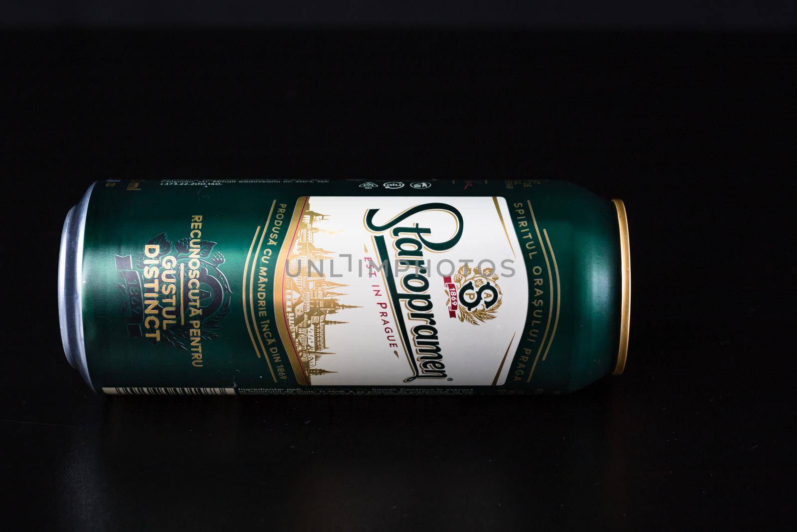 Staropramen  beer can isolated on black background. Bucharest, Romania, 2021 by vladispas