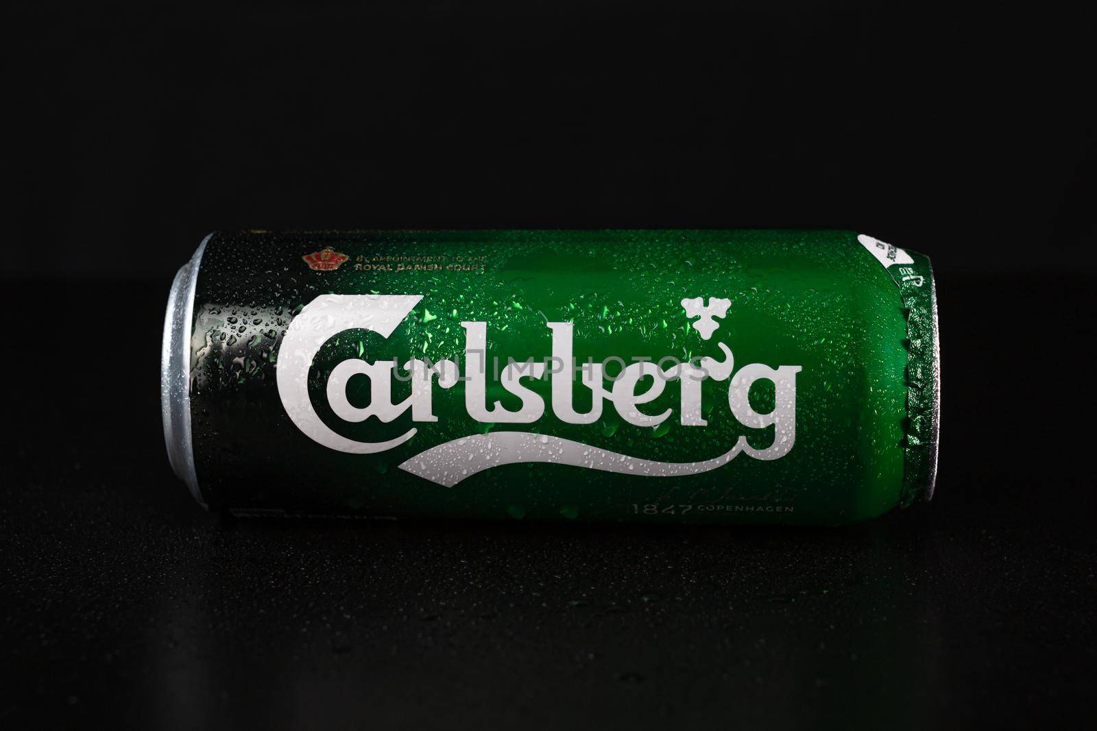 Carlsperg beer can isolated on black background. Bucharest, Romania, 2021 by vladispas