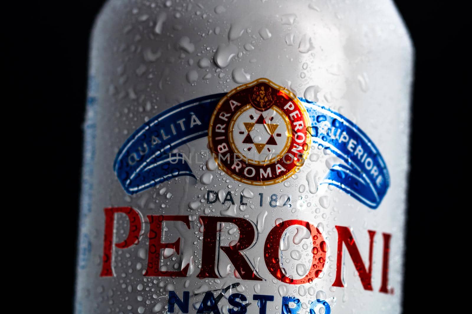 Detail of water droplets on Peroni Nastro Azzurro, a premium lager beer. Studio photo shoot in Bucharest, Romania, 2021