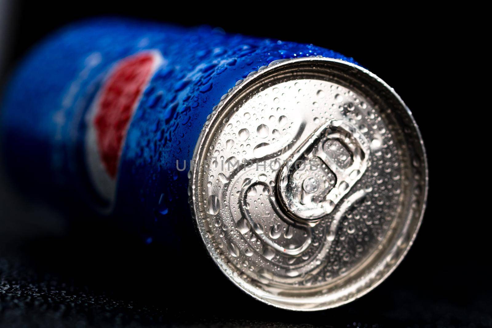 Editorial photo of Pepsi can with water droplets on black background. Studio shot in Bucharest, Romania, 2021 by vladispas