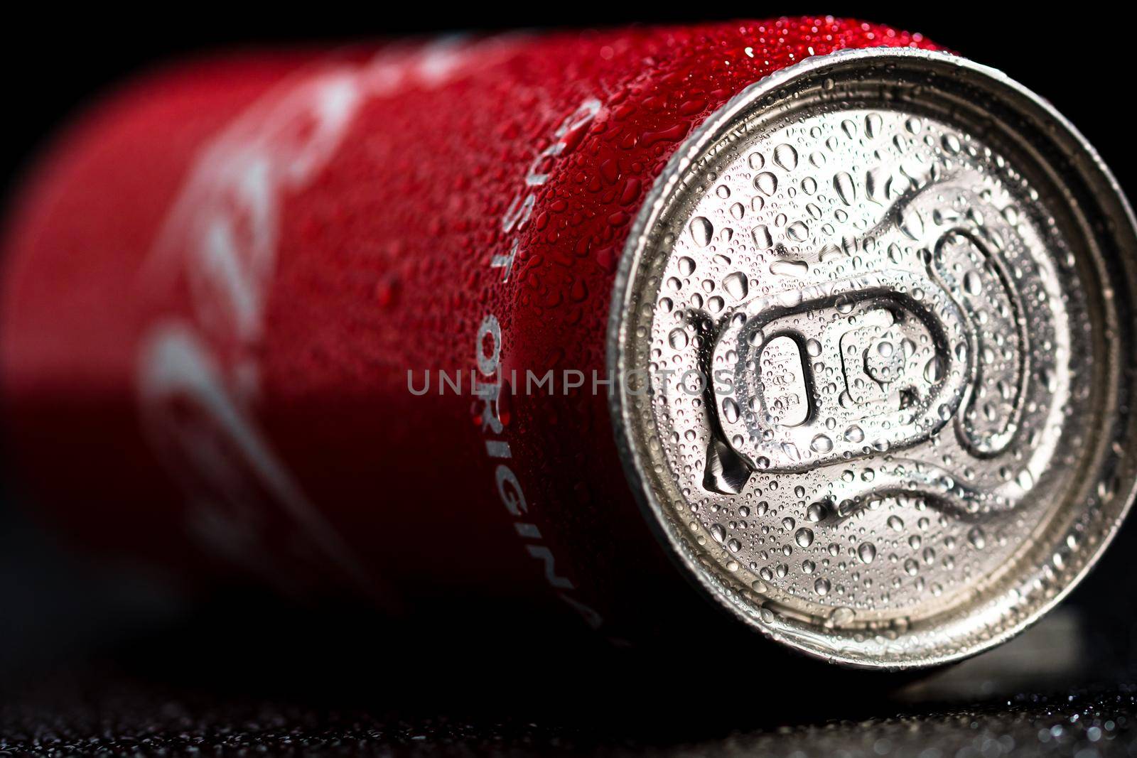 Water droplets on classic Coca-Cola can on black background. Studio shot in Bucharest, Romania, 2021