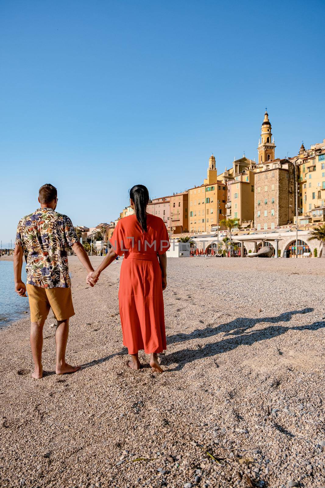 View on old part of Menton, Provence-Alpes-Cote d'Azur, France Europe during summer, couple men and woman on vacation at Menton France