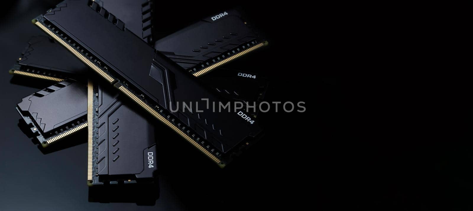 New DDR4 RAM modules on a black table by galinasharapova